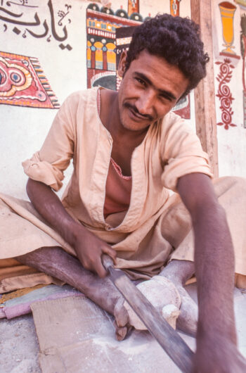 An artisan making an alabaster vase on the West Bank of the Nile at Luxor, Egypt