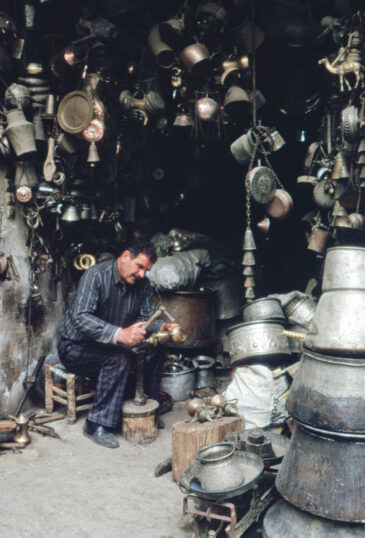 The Copper Souk in Aleppo, known locally as Souk al-Nahhasin, was built in 1539 and is situated within the historic Al-Madina Souq in the heart of Aleppo's Old City. This souk has been a center for copper craftsmanship for centuries, with artisans producing and selling intricately designed copperware. The souk's narrow, covered alleys are lined with shops displaying a variety of copper items, from traditional cookware to decorative pieces.