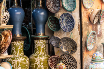 Ceramics vendor on street of medina in Marrakesh, Morocco