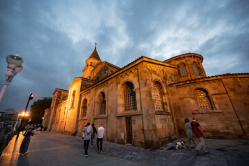 Iglesia de San Pedro (St Peter's Church) in Gijón, Asturias, Spain at twilight. Located in Campo Valdés, at one end of San Lorenzo beach and at the foot of the Cimadevilla neighborhood