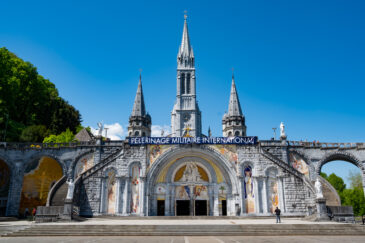 Lourdes is a town in southwestern France, in the foothills of the Pyrenees mountains. It’s known for the Sanctuaires Notre-Dame de Lourdes, or the Domain, a major Catholic pilgrimage site. Each year, millions visit the Grotto of Massabielle (Grotto of the Apparitions) where, in 1858, the Virgin Mary is said to have appeared to a local woman. In the grotto, pilgrims can drink or bathe in water flowing from a spring.