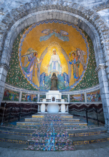 Lourdes is a town in southwestern France, in the foothills of the Pyrenees mountains. It’s known for the Sanctuaires Notre-Dame de Lourdes, or the Domain, a major Catholic pilgrimage site. Each year, millions visit the Grotto of Massabielle (Grotto of the Apparitions) where, in 1858, the Virgin Mary is said to have appeared to a local woman. In the grotto, pilgrims can drink or bathe in water flowing from a spring.
