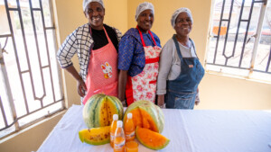 Masego Ramolaise, a farmer in a village near Lentsweletau in southern Botswana, with her helpers Molaletsa Regoeng and Sarona Ntsima. They are processing a cooking melon to make juice.
Photo taken during a visit to Botswana from 18-20 October 2023 to document success stories under a project “Improving Agricultural Resilience to Salinity through Development and Promotion of Pro-poor Technologies (RESADE)” implemented by the International Center for Biosaline Agriculture (ICBA) and funded by the International Fund for Agricultural Development (IFAD) and the Arab Bank for Economic Development in Africa (BADEA).
More information about the project can be found at: resade.biosaline.org/
Photo credit: Michael Major for ICBA