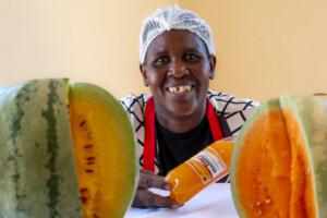Masego Ramolaise, a farmer in a village near Lentsweletau in southern Botswana, showing off her letrose juice.
Photo taken during a visit to Botswana from 18-20 October 2023 to document success stories under a project “Improving Agricultural Resilience to Salinity through Development and Promotion of Pro-poor Technologies (RESADE)” implemented by the International Center for Biosaline Agriculture (ICBA) and funded by the International Fund for Agricultural Development (IFAD) and the Arab Bank for Economic Development in Africa (BADEA).
More information about the project can be found at: resade.biosaline.org/
Photo credit: Michael Major for ICBA