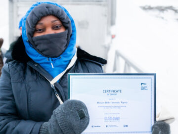 Ramatu Aliyu, Ahmadu Bello University, Nigeria displays her deposit certificate.
Deposit ceremony featuring BOLD WP4 partners on 25 February 2025.
BOLD WP4 closing visit to the Svalbard Global Seed Vault, 24-26 February 2025. 
Photo: Michael Major for Crop Trust