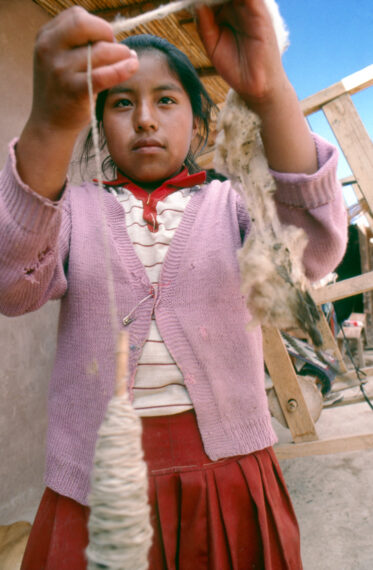 Weaver girl in Cuzco, Peru