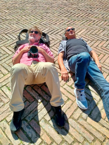 Peter and I illegally lying under a soothing Tuscan sun in the Piazza del Compo in Sienna, Italy.