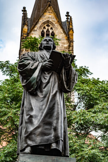 The Erfurt Luther Monument is located on the northern side of the Angers in Erfurt. The bronze statue shows the reformer with the open Bible in hand. The monument was designed by Fritz Schaper and inaugurated in 1889. Erfurt is the capital and largest city in the state of Thuringia, central Germany.