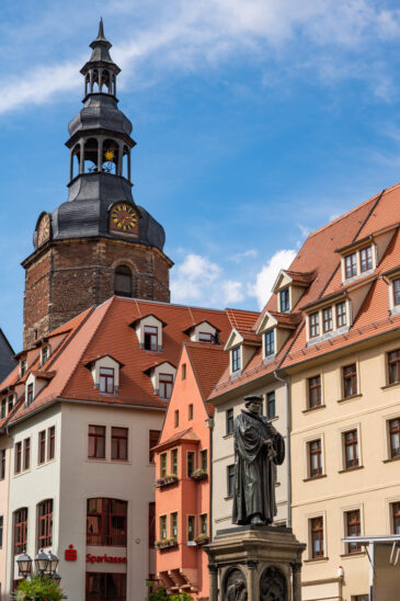 Statute of Martin Luther in Market Square of Lutherstadt Eisleben in Saxony-Anhalt, Germany. Martin Luther was born in Eisleben in 1483 and died here in 1546.