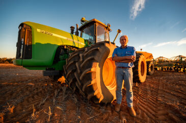 Farmer dry sowing wheat with GPS-guided direct seeder in Kimba, South Australia under dry conditions