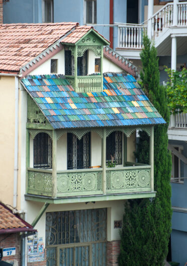 Colourful home with balcony on hillside in the old town of Tbilisi, Georgia