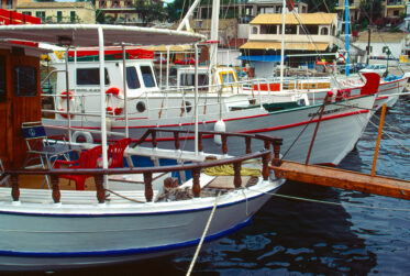 Corfu. Boats docked at harbor in Kassiopi.