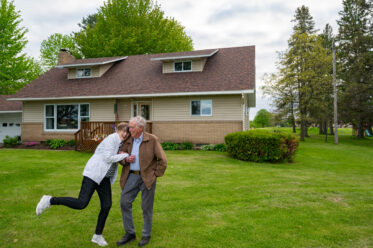 Jean and Earl in front of their home in Amery, Wisconsin