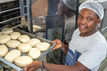 Esther Yoham Majija uses traditional African vegetables in products she makes at her bakery, the Fortlene Bakery, in Babati, Tanzania. A team from BOLDER and World Vegetable Center visited her to see products made with Bambara groundnut.
Photo: Michael Major for Crop Trust