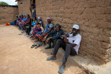 Rose Saimon Kimati, with the help of her two daughters, cooks Bambara groundnut in Unyamikumbi, Singida, Tanzania.
Photo: Michael Major for Crop Trust