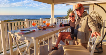 Welcome Aperol Spritzes on our balcony overlooking the Indian Ocean
